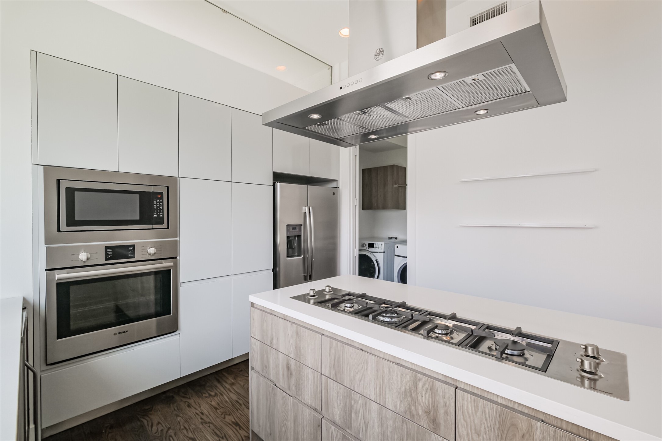 1157 West 18th Street Houston, TX 77008 - Photo 14 of 41 a kitchen with stainless steel appliances granite countertop a stove and a refrigerator