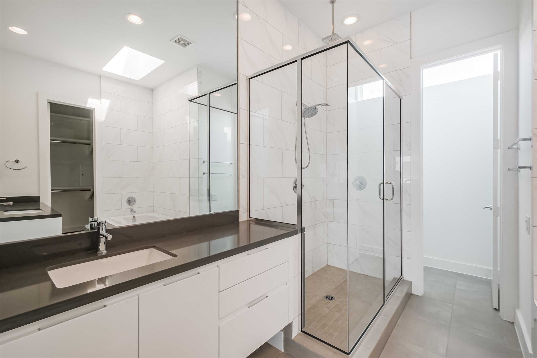 1157 West 18th Street Houston, TX 77008 - Photo 28 of 41 a bathroom with a granite countertop sink mirror and double