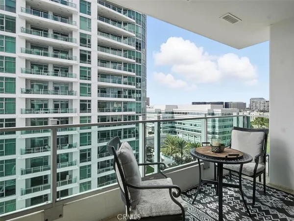 a view of a chairs in a balcony