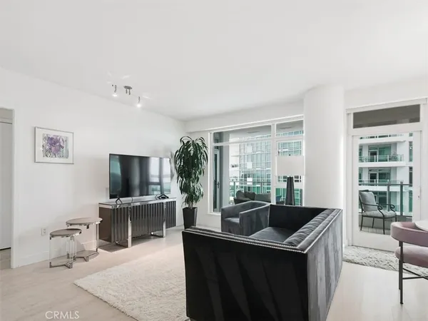 a kitchen with a sink and a stove top oven