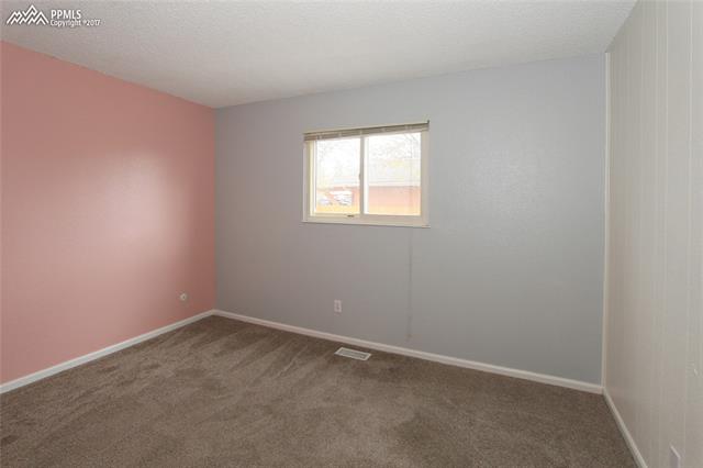 1835 Monterey Road Colorado Springs, CO 80910 - Photo 16 of 22 Third bedroom