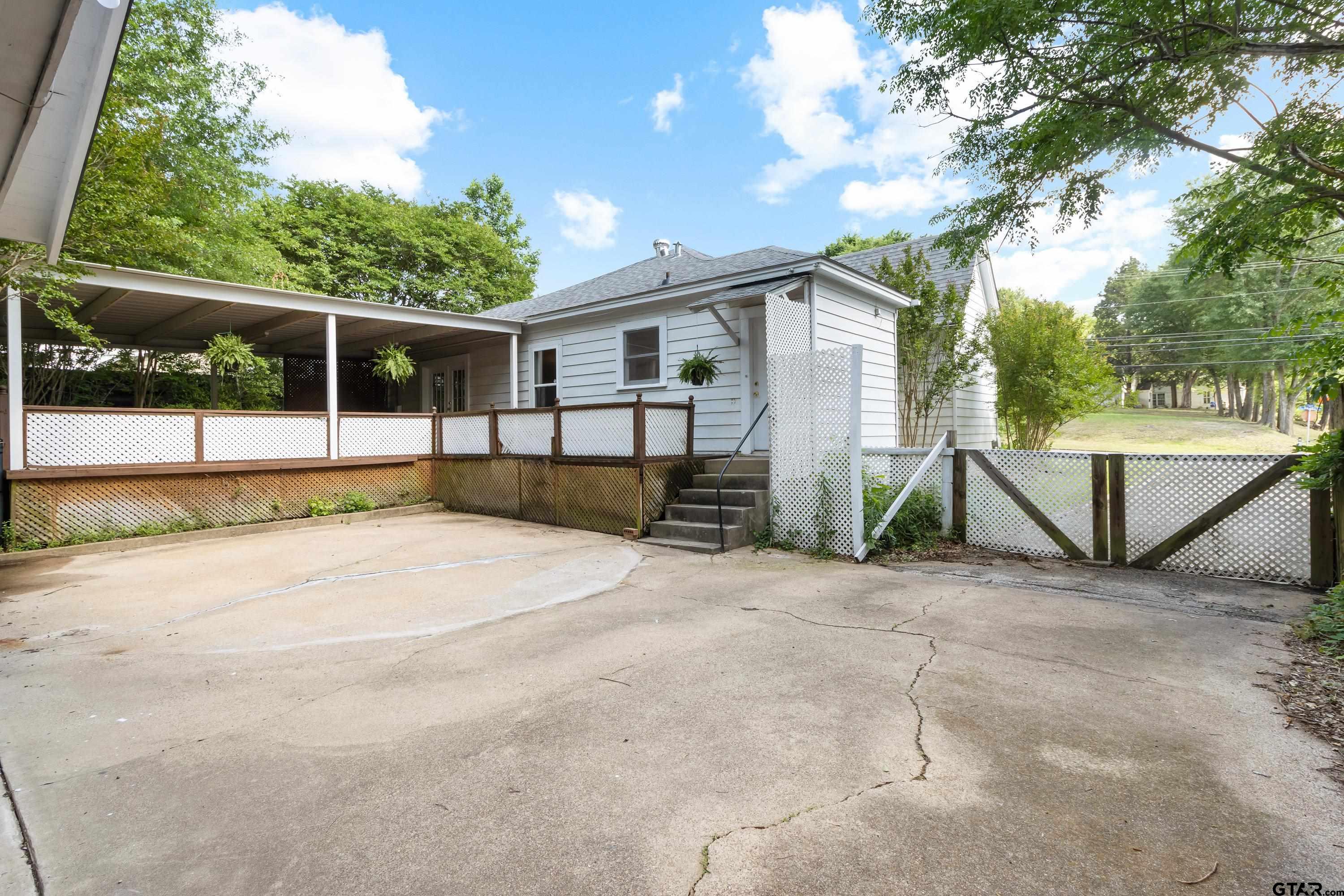 514 West Main Street Henderson, TX 75652 - Photo 22 of 35 a view of a backyard