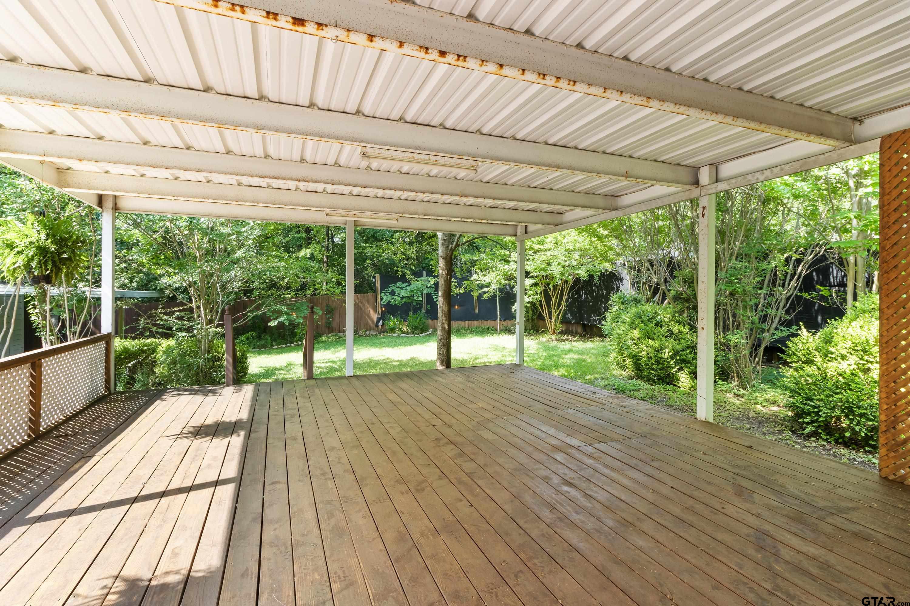 514 West Main Street Henderson, TX 75652 - Photo 28 of 35 a view of a house with porch and wooden floor