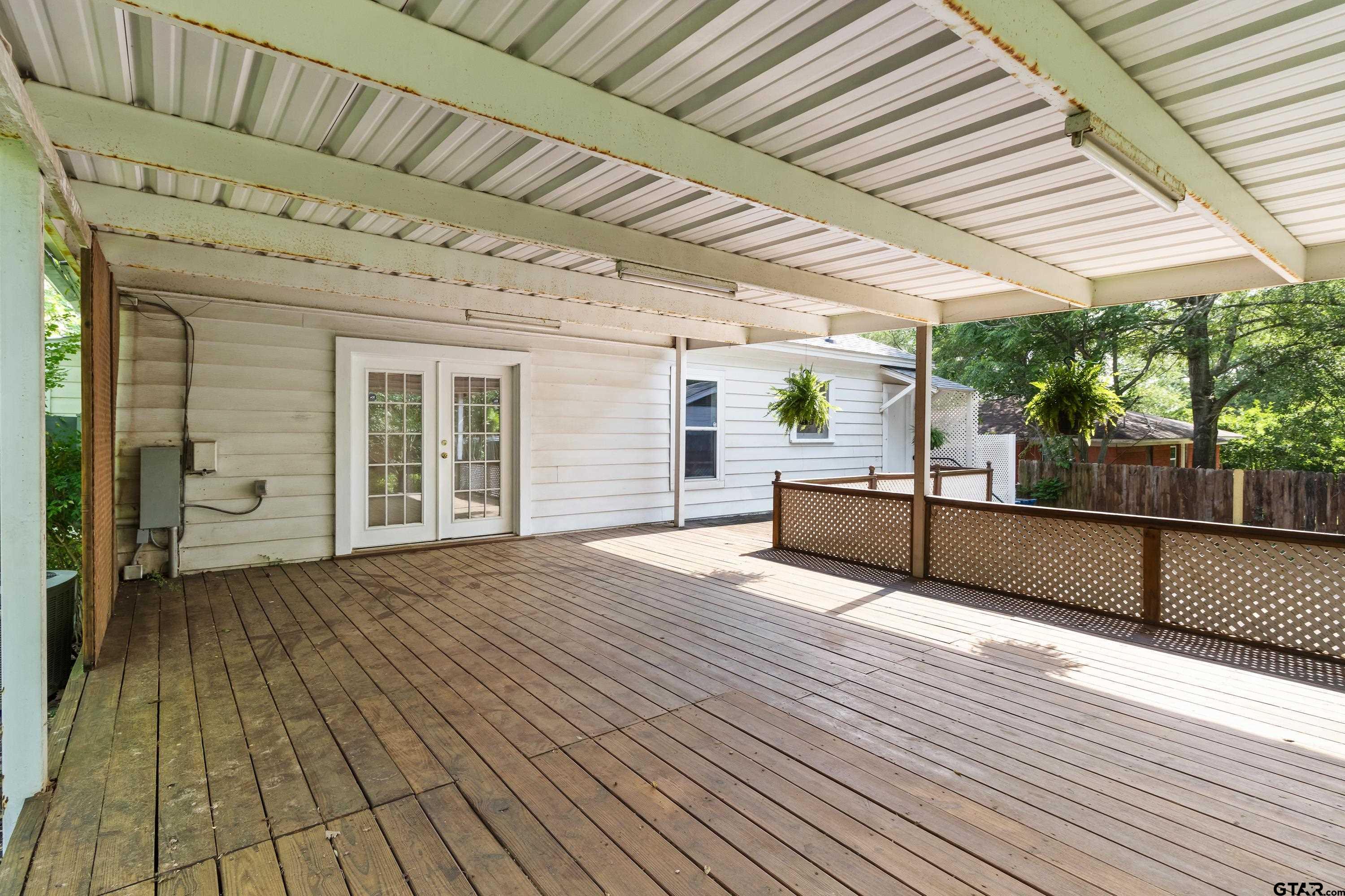 514 West Main Street Henderson, TX 75652 - Photo 29 of 35 a view of a patio with wooden floor