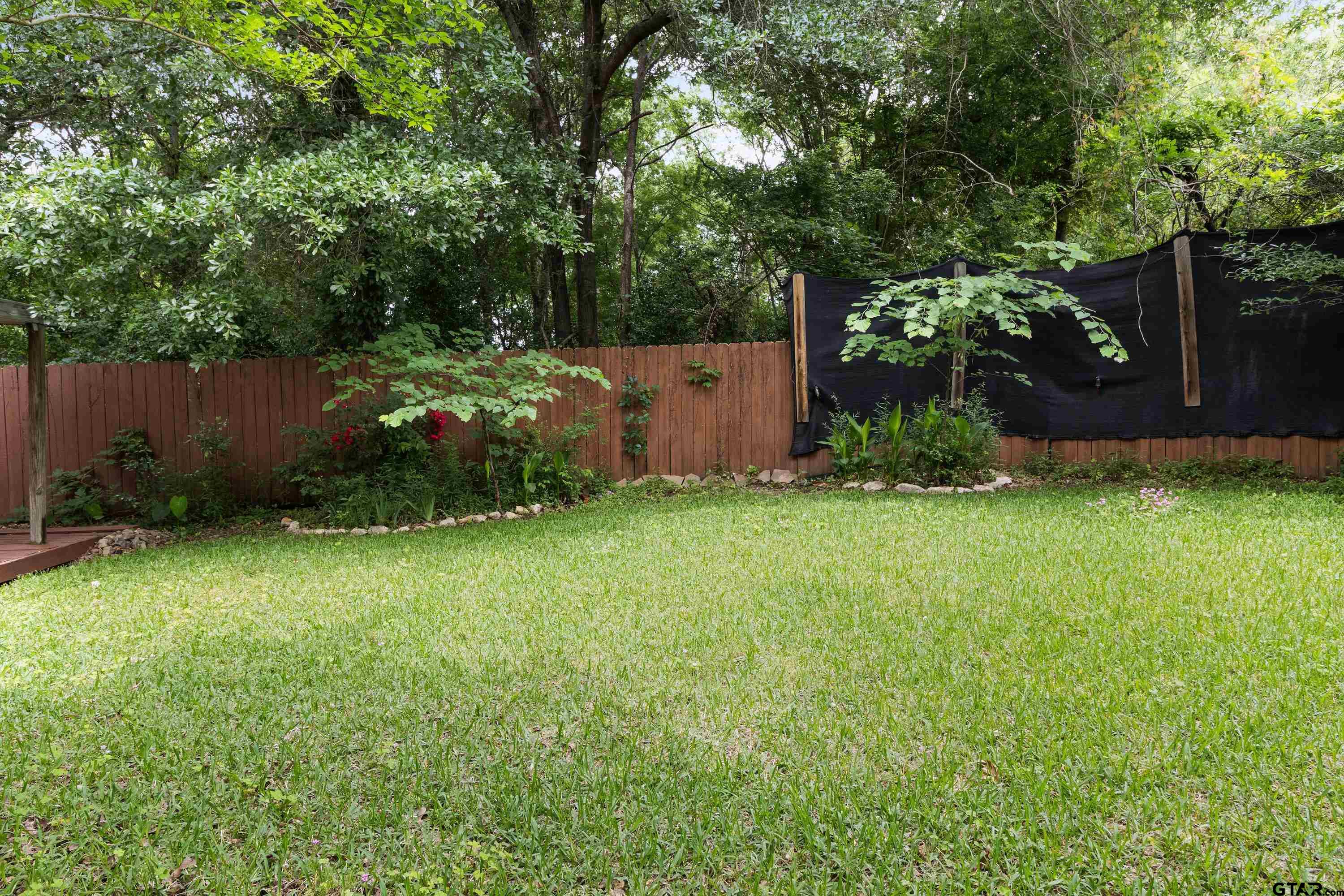 514 West Main Street Henderson, TX 75652 - Photo 32 of 35 a view of a backyard