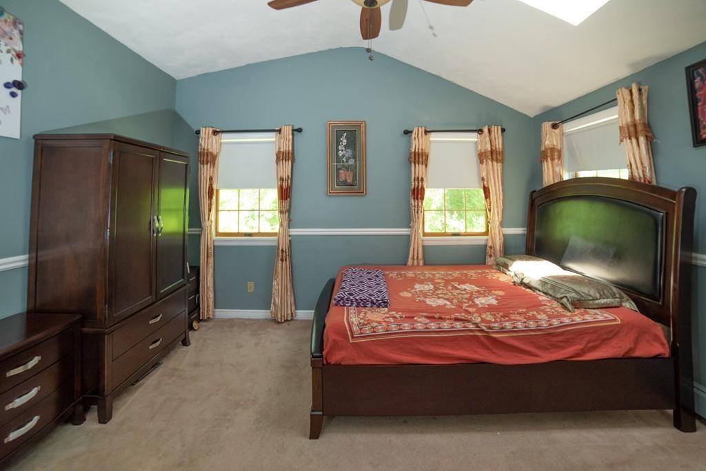 46 Dover Road Millis, MA 02054 - Photo 13 of 28 a bedroom with a bed dresser and a window