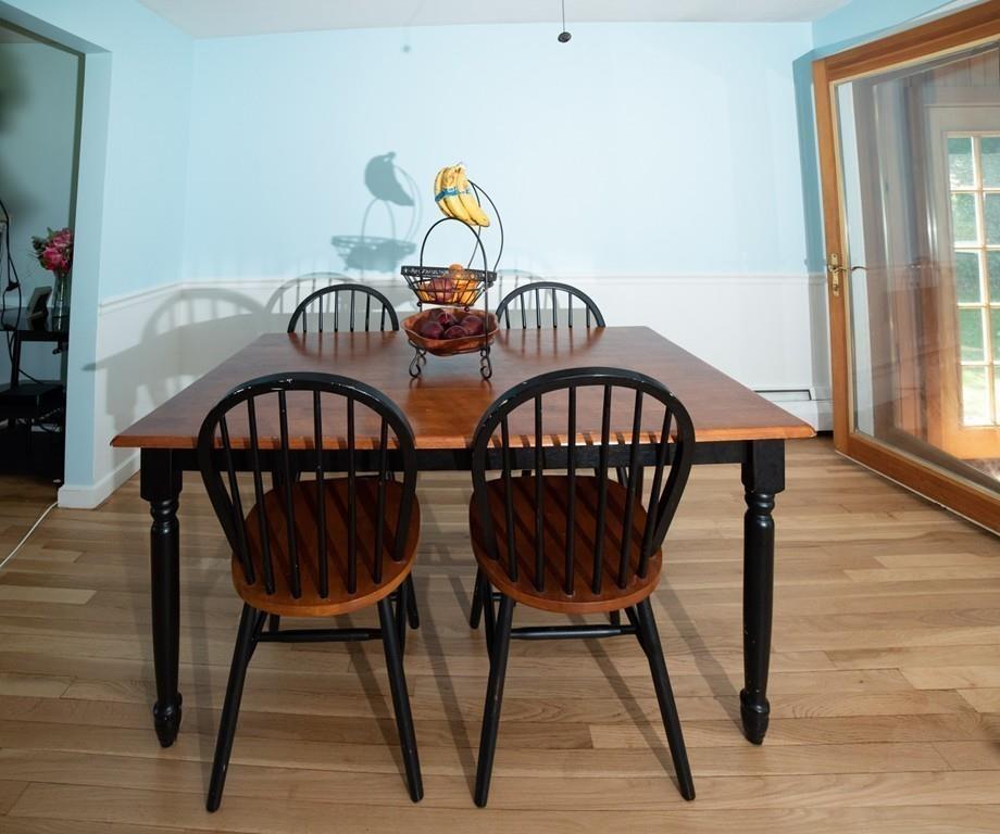 46 Dover Road Millis, MA 02054 - Photo 19 of 28 a view of a chairs and table in kitchen