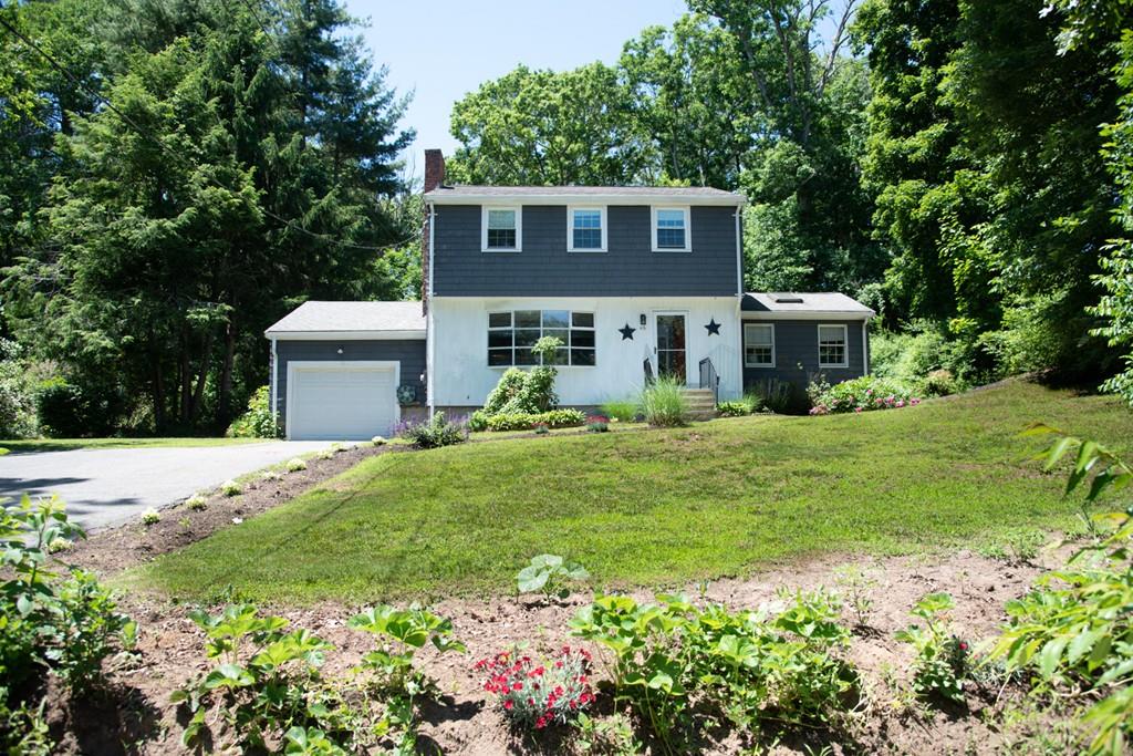 46 Dover Road Millis, MA 02054 - Photo 3 of 28 a house view with a garden space