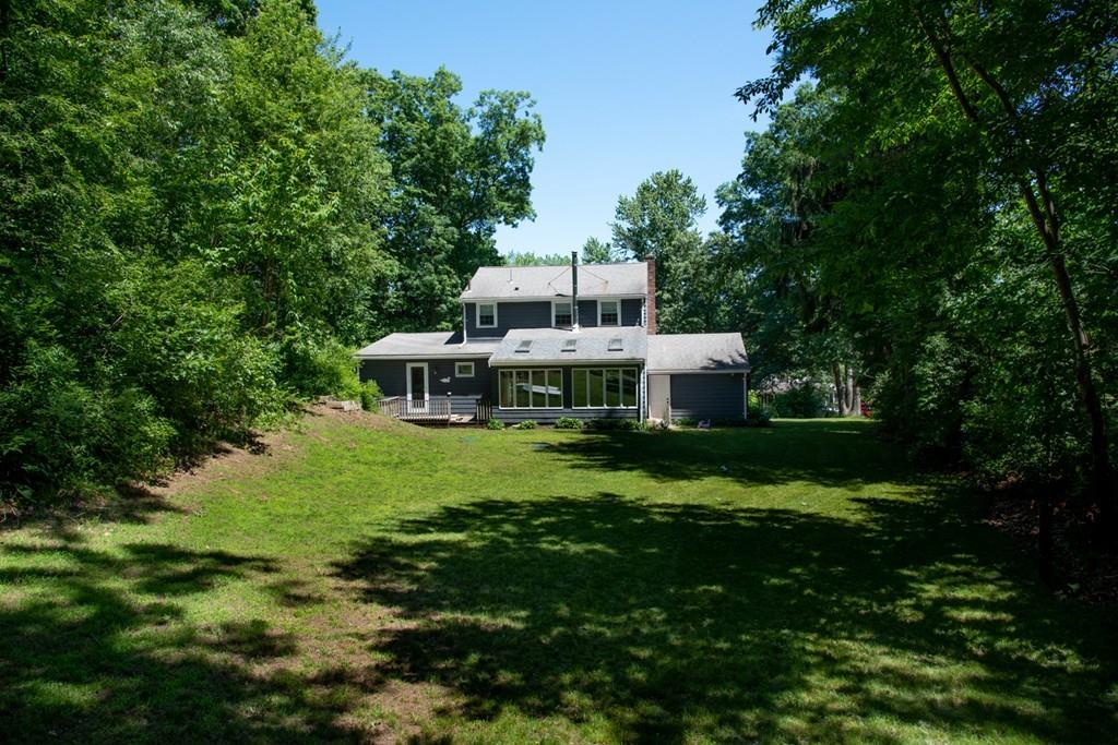 46 Dover Road Millis, MA 02054 - Photo 8 of 28 a view of a house with a yard