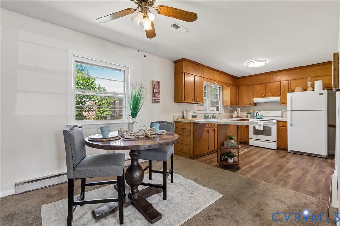 803 Belfast Avenue Hampton, VA 23661 - Photo 11 of 34 a view of a dining room with furniture window and outside view