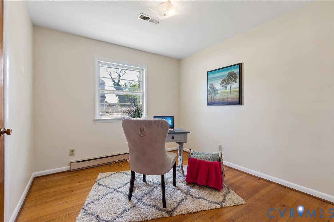 803 Belfast Avenue Hampton, VA 23661 - Photo 18 of 34 a workspace with furniture and a window