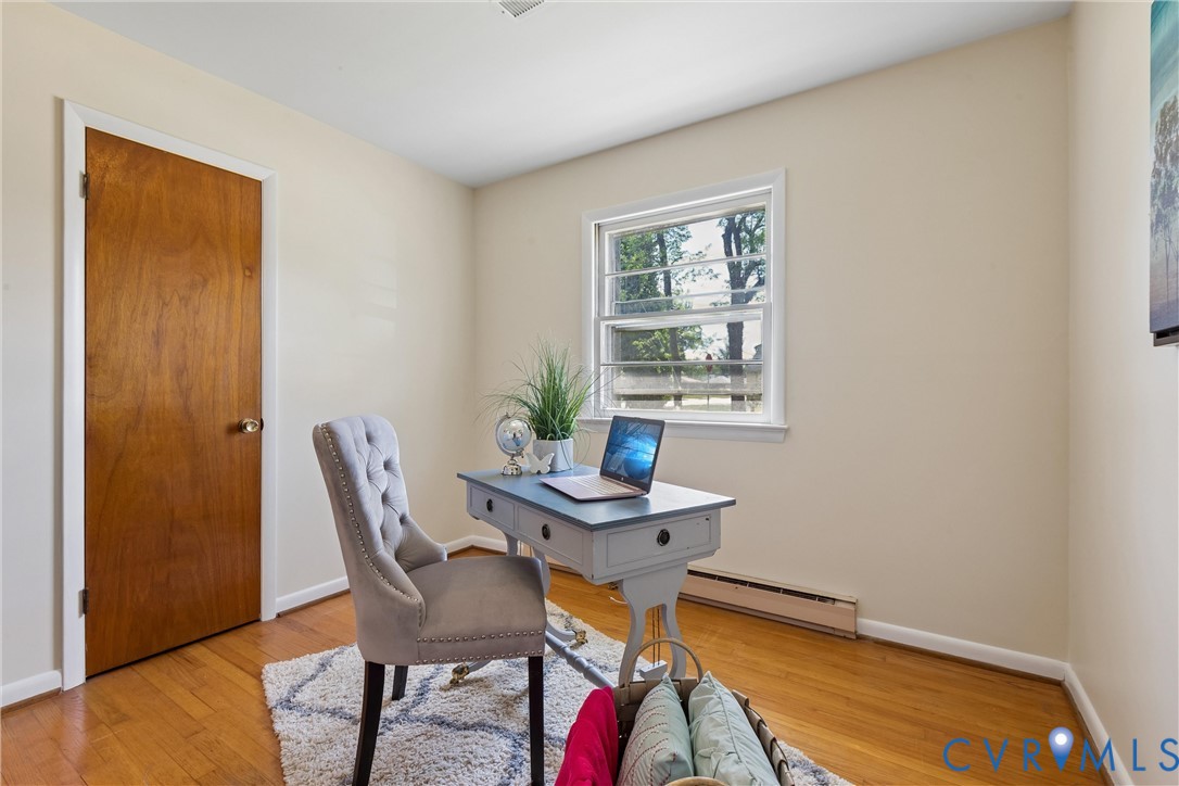 803 Belfast Avenue Hampton, VA 23661 - Photo 20 of 34 a view of a workspace with furniture and a window
