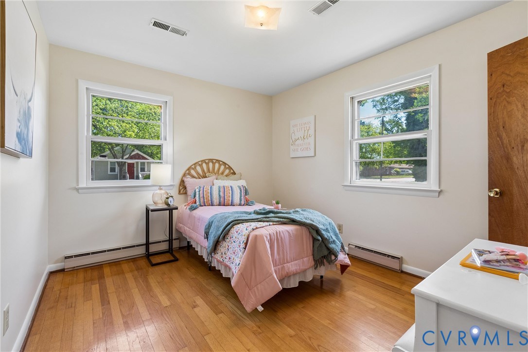 803 Belfast Avenue Hampton, VA 23661 - Photo 21 of 34 a bedroom with a bed and a window