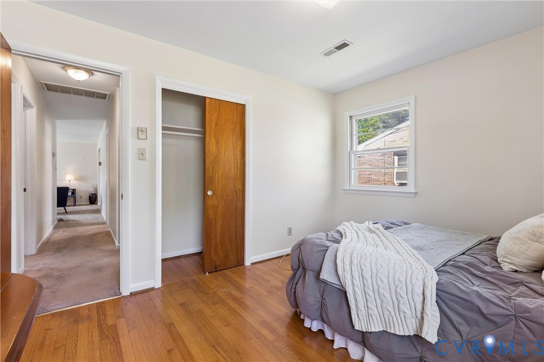 803 Belfast Avenue Hampton, VA 23661 - Photo 25 of 34 a view of bedroom with wooden floor