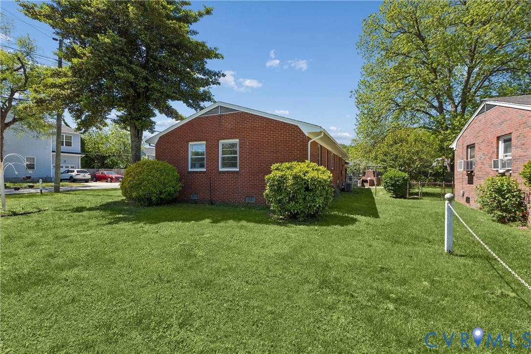803 Belfast Avenue Hampton, VA 23661 - Photo 5 of 34 a front view of a house with garden
