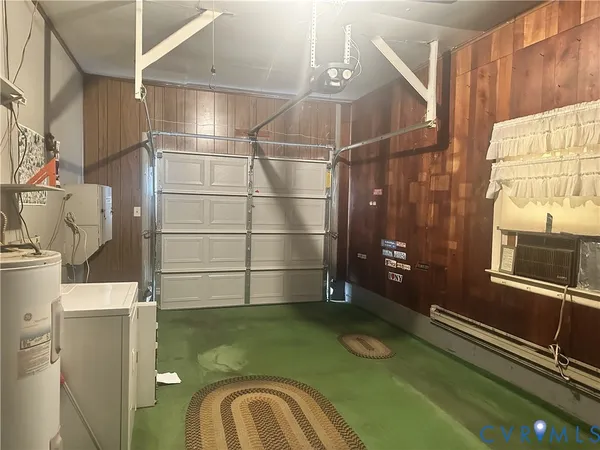 a bathroom with a sink a mirror and a shower