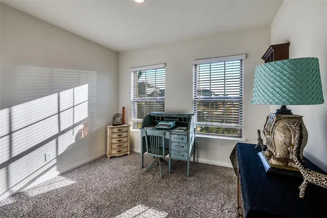 a bed room with a bed and a dresser