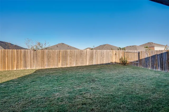 a bathroom with a double vanity sink toilet and shower
