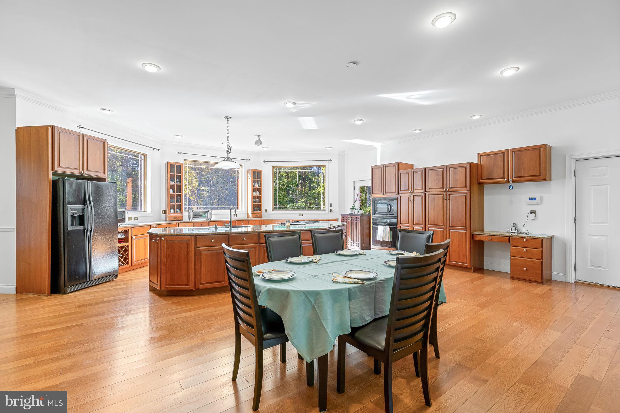 895 Stefaniga Road Stafford, VA 22556 - Photo 12 of 41 a view of a dining room with furniture and wooden floor