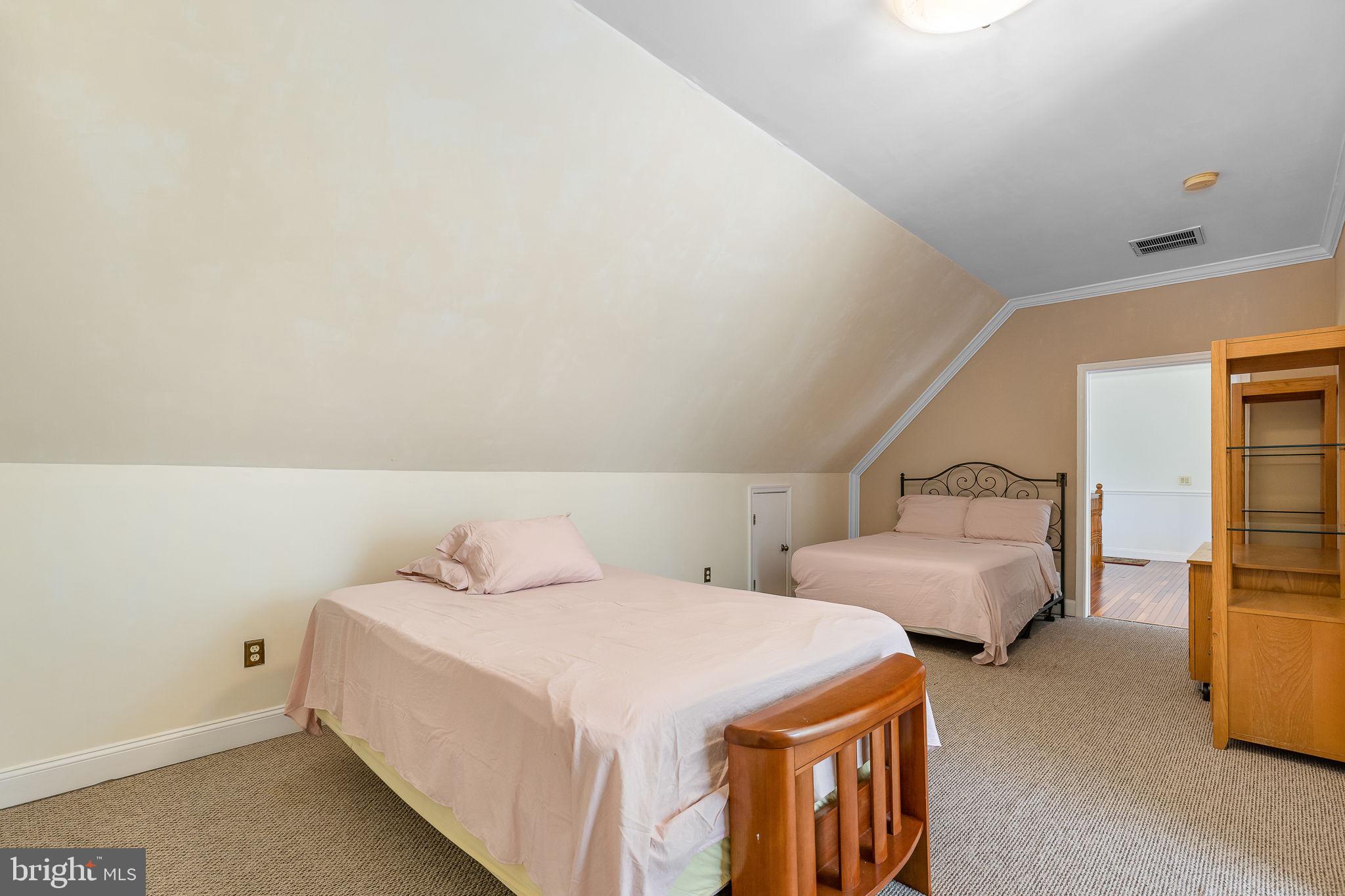 895 Stefaniga Road Stafford, VA 22556 - Photo 31 of 41 a bedroom with two beds and painted walls