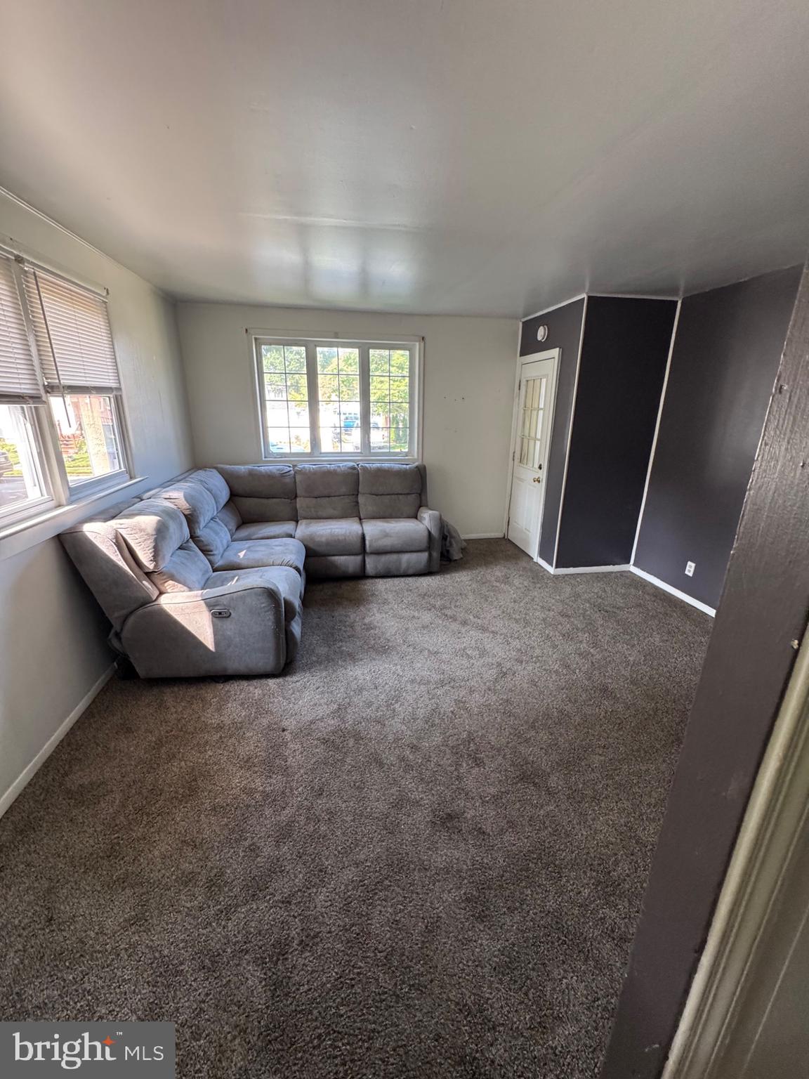 332 Fernwood Avenue Folsom, PA 19033 - Photo 13 of 37 Spacious living area with natural light.