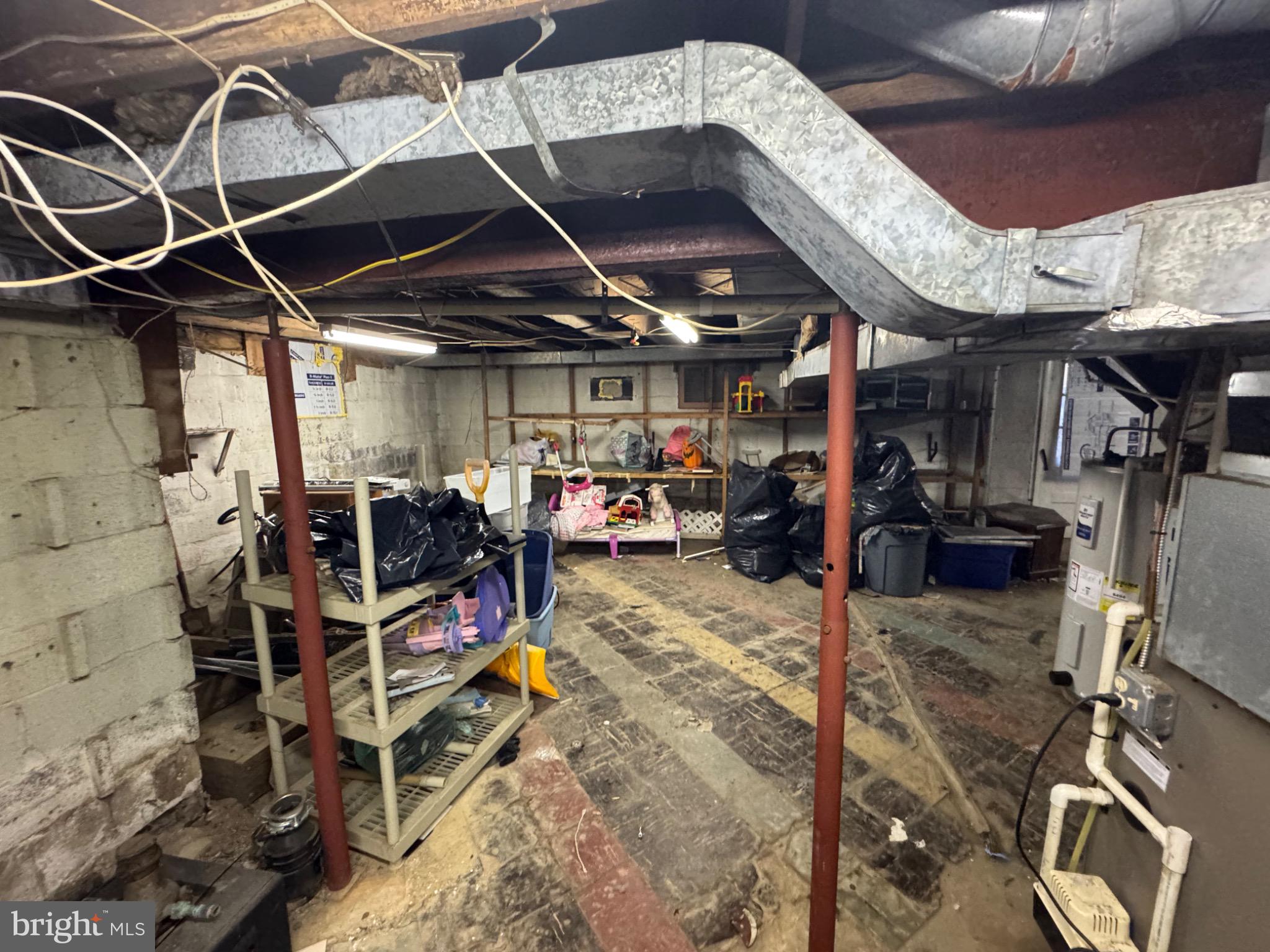 332 Fernwood Avenue Folsom, PA 19033 - Photo 22 of 37 Spacious basement with potential for transforma...
