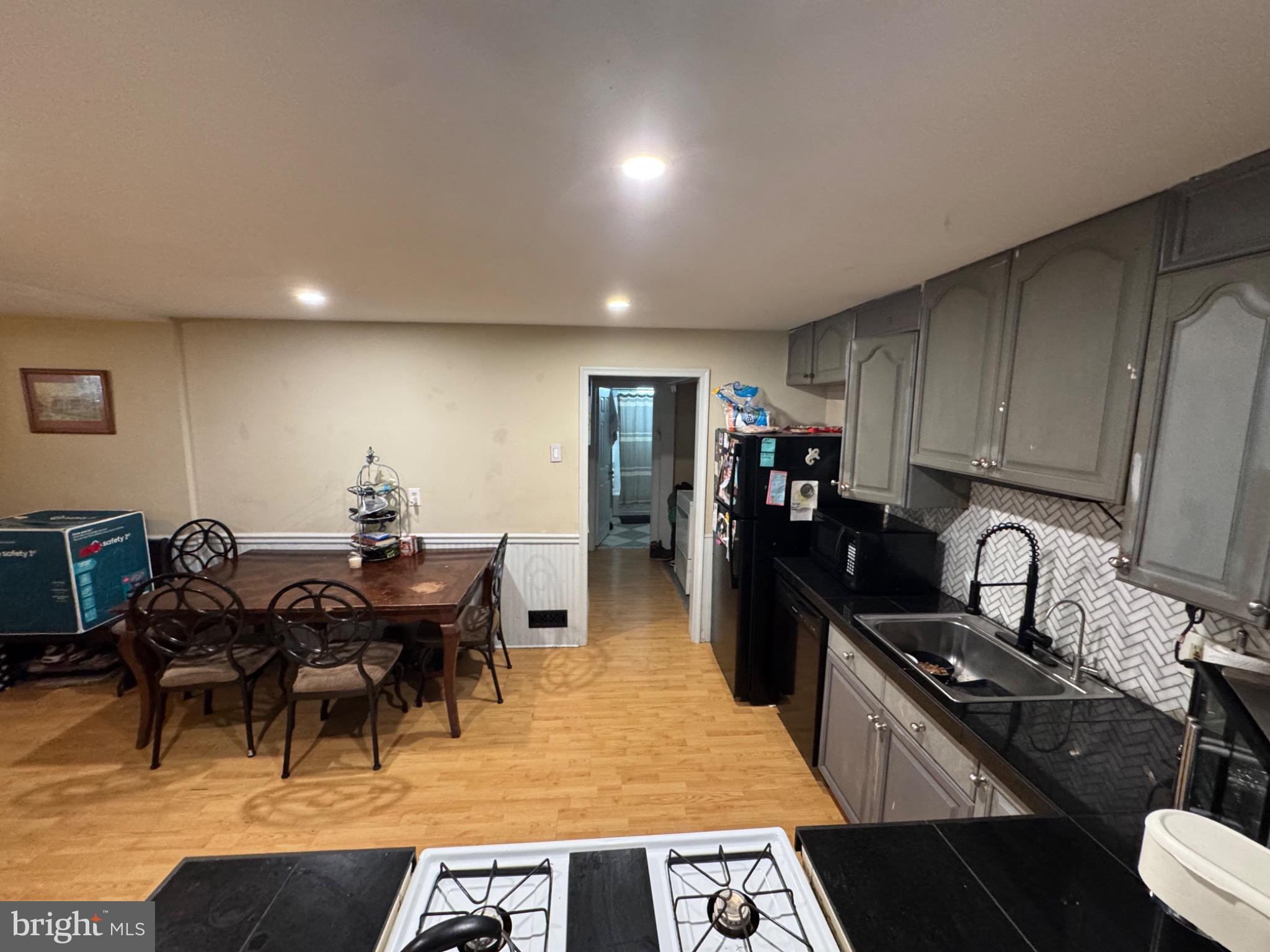 332 Fernwood Avenue Folsom, PA 19033 - Photo 26 of 37 Modern kitchen with inviting dining area.
