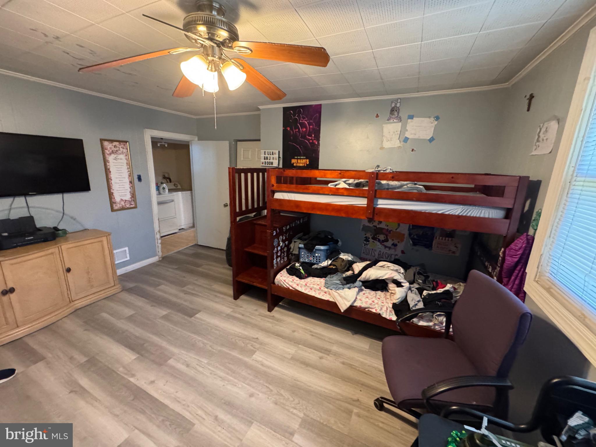 332 Fernwood Avenue Folsom, PA 19033 - Photo 29 of 37 Cozy room with a bunk bed and natural light.