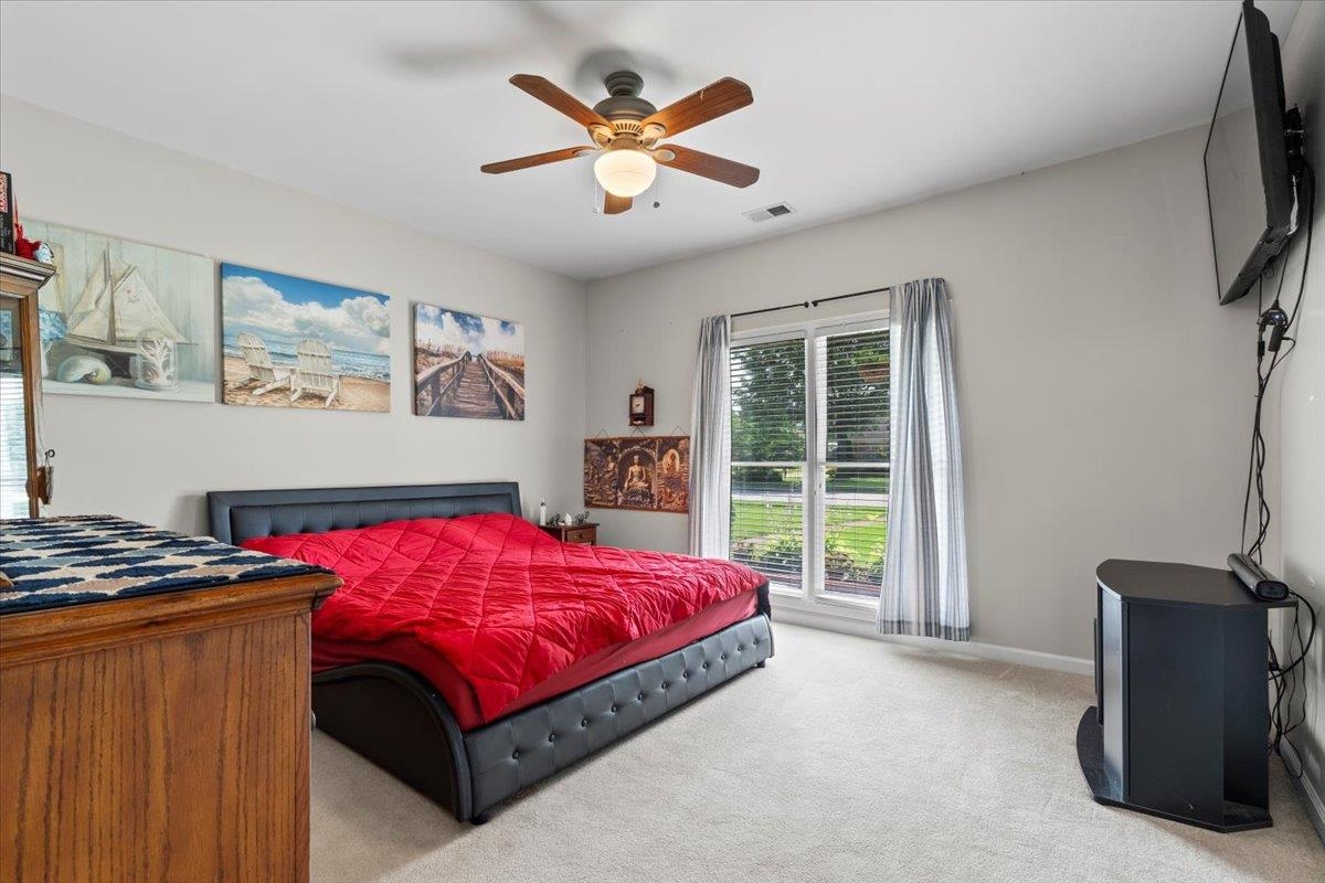 1675 John Ridge Drive Collierville, TN 38017 - Photo 11 of 39 Bedroom featuring carpet, a ceiling fan, and baseboards