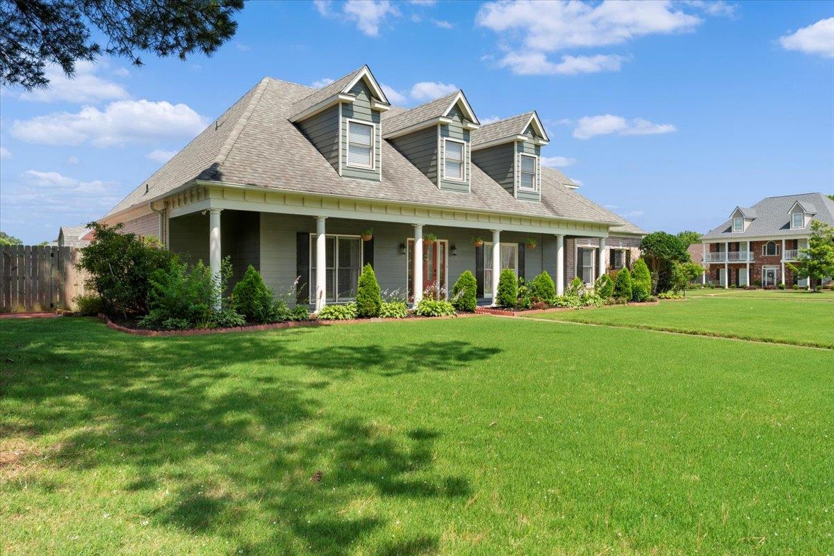 1675 John Ridge Drive Collierville, TN 38017 - Photo 3 of 39 View of front of property featuring covered porch and a shingled roof