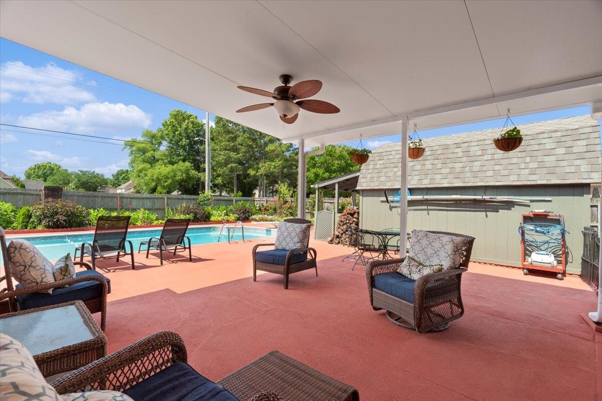1675 John Ridge Drive Collierville, TN 38017 - Photo 32 of 39 Fenced backyard featuring a patio area and a ceiling fan