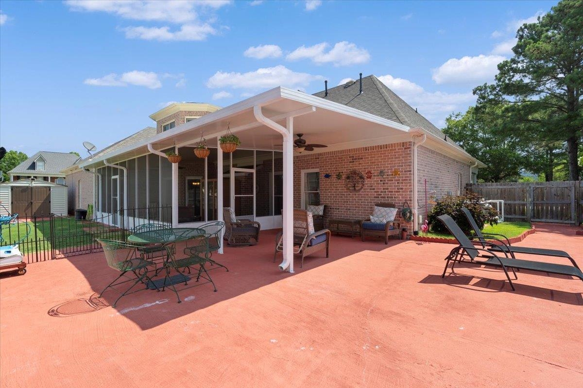 1675 John Ridge Drive Collierville, TN 38017 - Photo 33 of 39 View of patio with ceiling fan and a sunroom