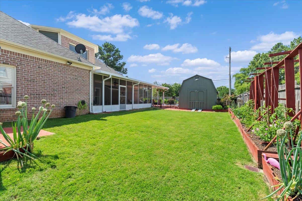 1675 John Ridge Drive Collierville, TN 38017 - Photo 39 of 39 View of yard featuring a sunroom