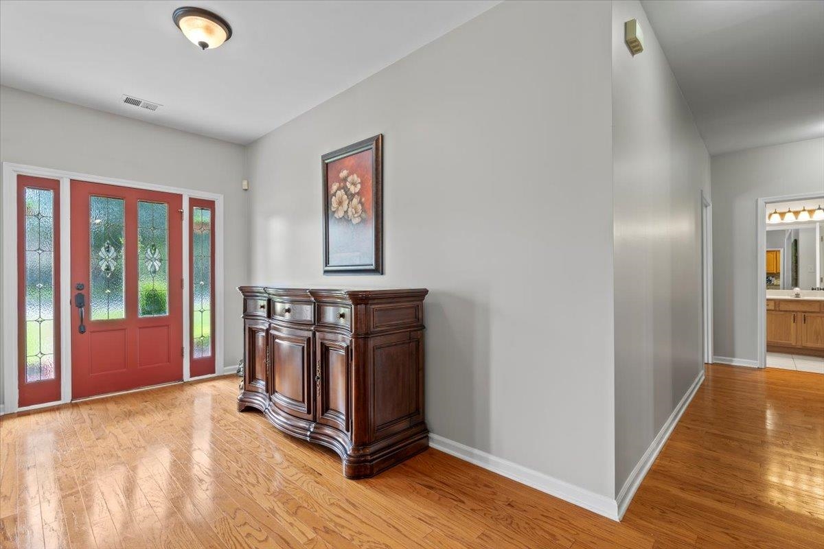 1675 John Ridge Drive Collierville, TN 38017 - Photo 10 of 39 Foyer with light wood finished floors and baseboards