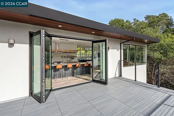 a view of livingroom with glass door and porch