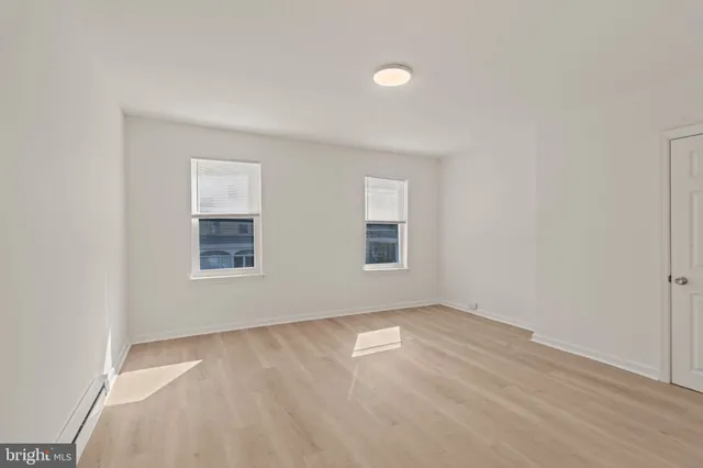 an empty room with windows