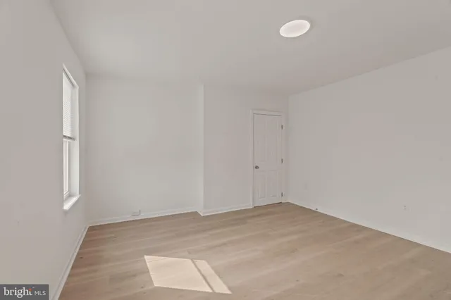 an empty room with a workbench