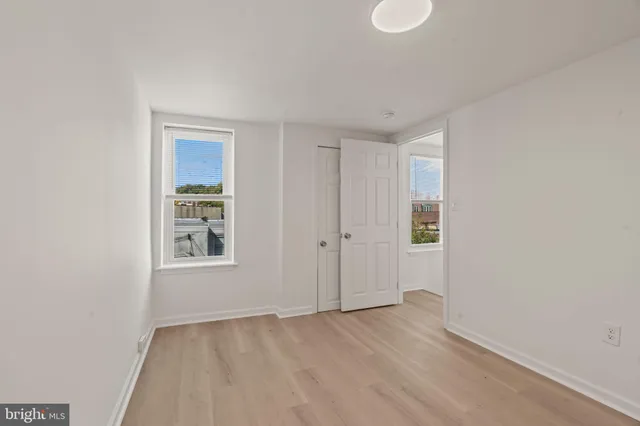 an empty room with windows