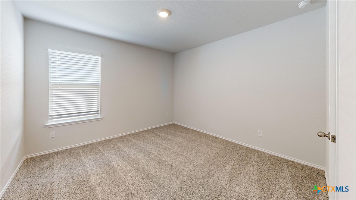 1302 Merritt Road Temple, TX 76504 - Photo 23 of 31 a view of an empty room with a window