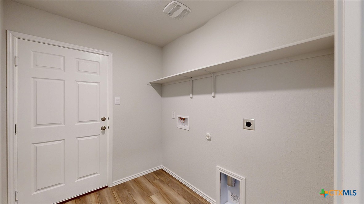 1302 Merritt Road Temple, TX 76504 - Photo 27 of 31 a view of room with hardwood floor