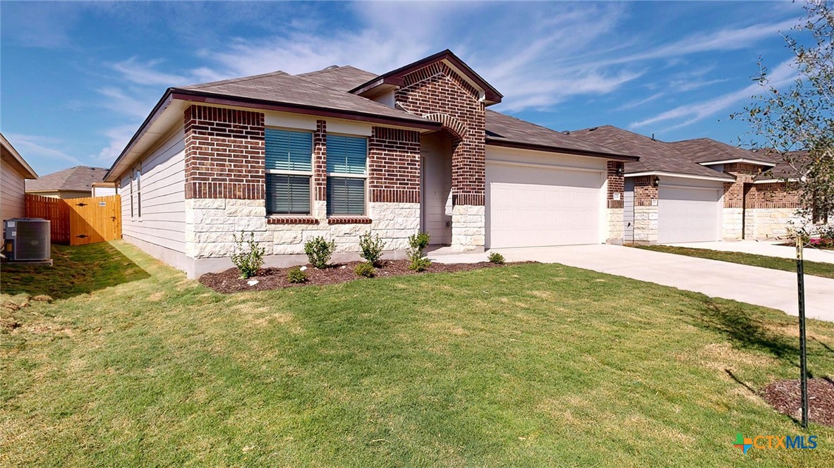 1302 Merritt Road Temple, TX 76504 - Photo 31 of 31 a front view of a house with garden