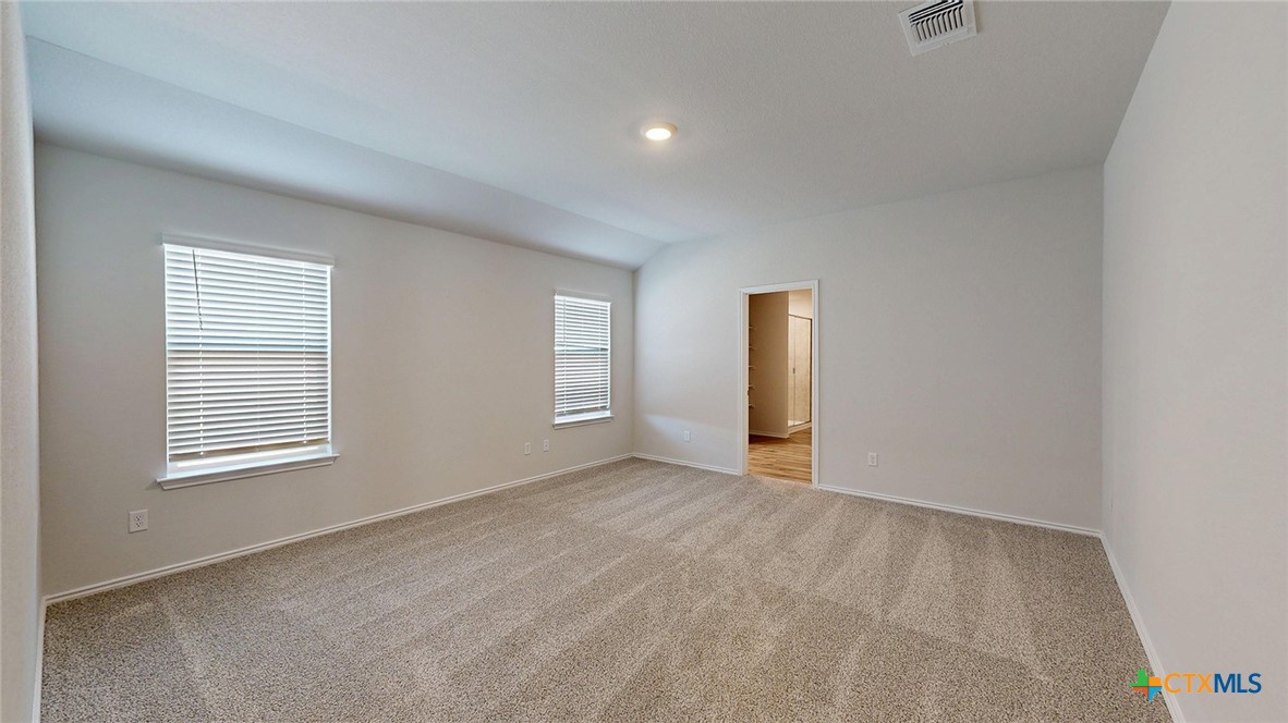1302 Merritt Road Temple, TX 76504 - Photo 9 of 31 an empty room with windows