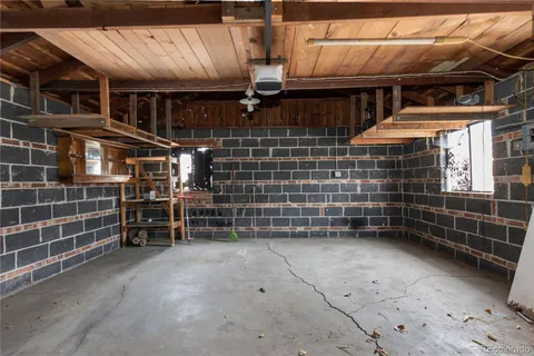 a view of outdoor space with wooden shelves