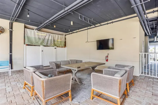 a view of a swimming pool with a yard