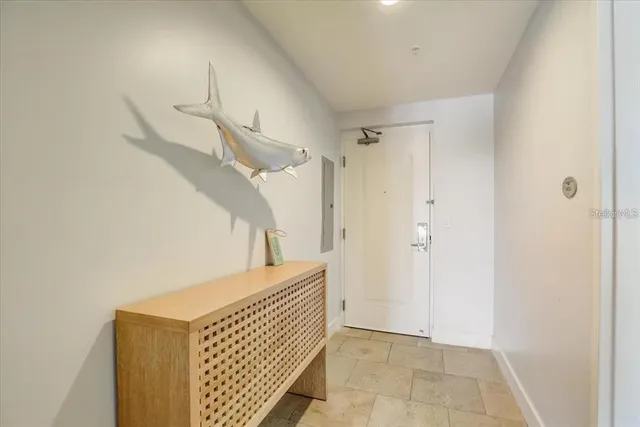 a view of entryway with stairs and wooden floor