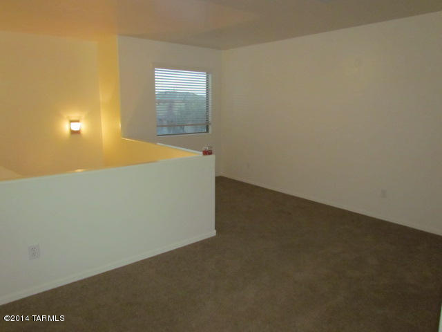 669 West Ash Ridge Drive Green Valley, AZ 85614 - Photo 17 of 17 a view of an empty room