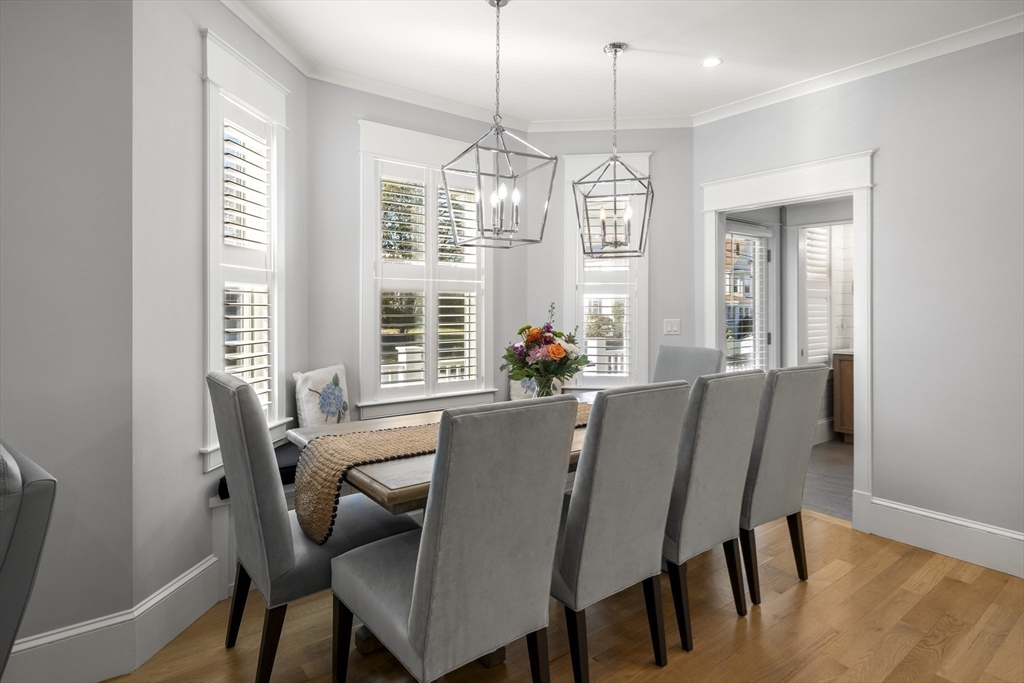 74-76 Butler Road Quincy, MA 02169 - Photo 12 of 41 a view of a dining room with furniture window and outside view