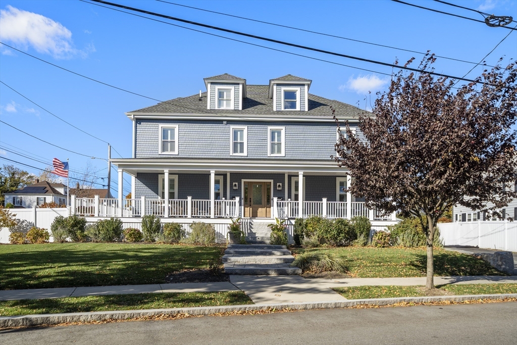 74-76 Butler Road Quincy, MA 02169 - Photo 3 of 41 a front view of a house with a yard