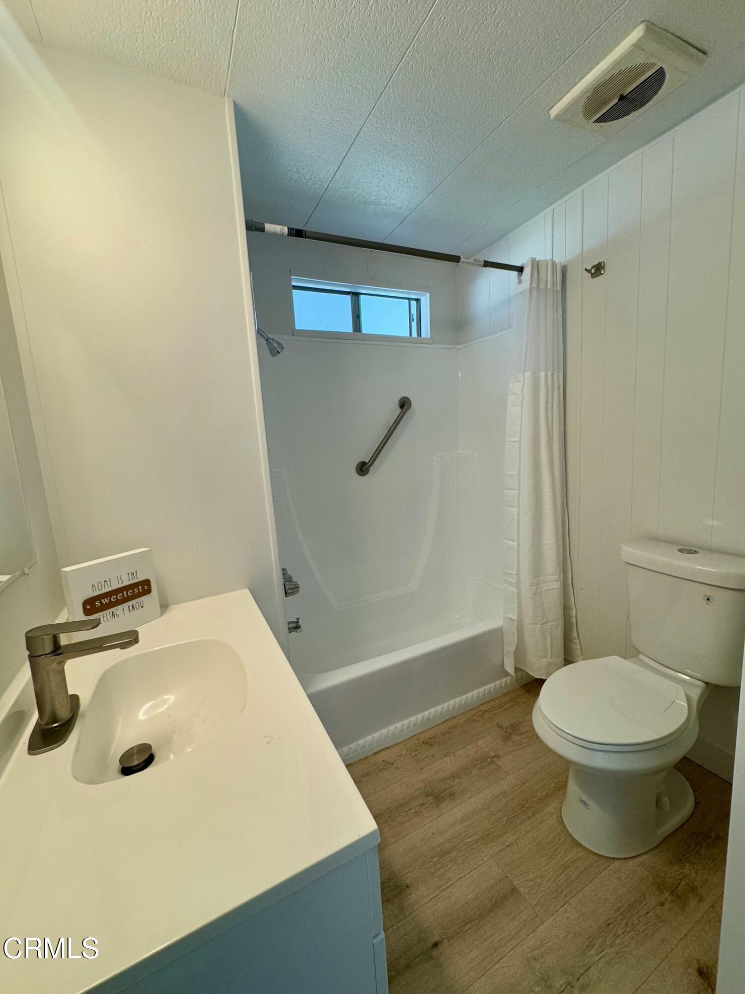 285 Ibsen Place, Unit 10 Oxnard, CA 93033 - Photo 16 of 32 a bathroom with a sink toilet and shower