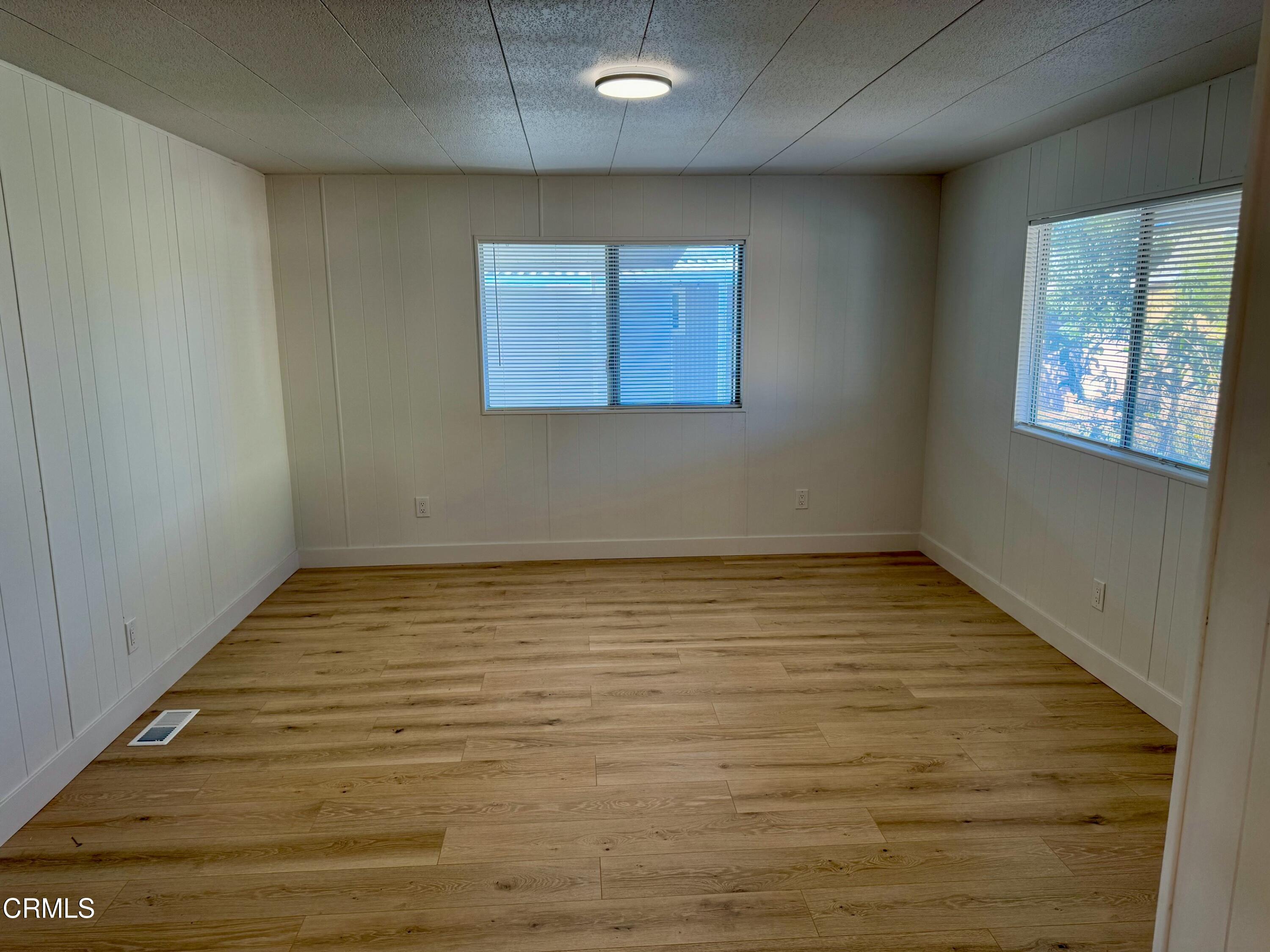 285 Ibsen Place, Unit 10 Oxnard, CA 93033 - Photo 20 of 32 wooden floor in an empty room